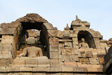 Borobudur Temple with the Buddha statue during sunrise, Yogyakarta, Indonesia