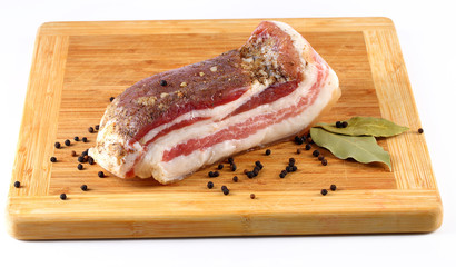 Fat  with pepper and bay leaf