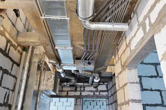 Ventilation system and electrical cables in a building under construction
