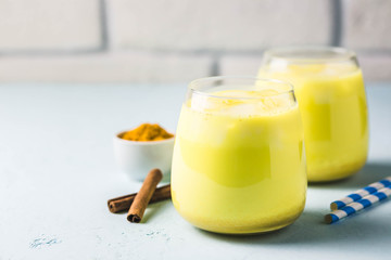 Iced turmeric latte. Selective focus, space for text.