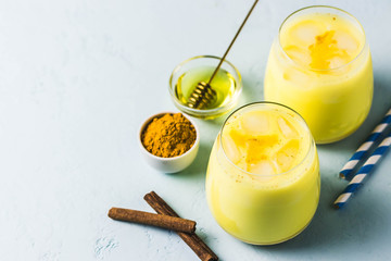 Iced turmeric latte. Selective focus, space for text.