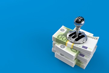 Fototapeta premium Gearshift on stack of money