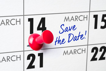 Wall calendar with a red pin - March 14