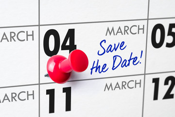 Wall calendar with a red pin - March 04