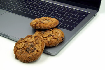 Cookies on a computer keyboard. Concept of internet cookies