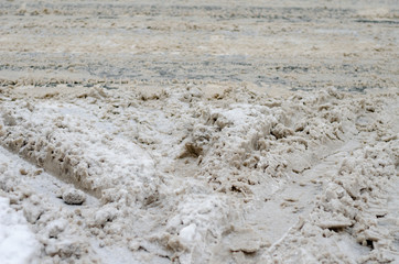dirty snow, snow bog on the road