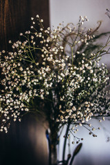 Vase of dry white flowers