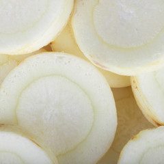 heap of slices of parsley root background