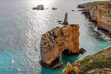 The rock with the hole and the rock of the two brothers, along the east coast of Syracuse
