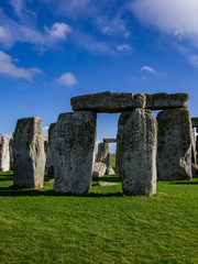 Close up view of middle part of Stonehenge monument. Daylight with blue sky. United Kingdom.
