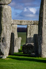 Close up view of middle part of Stonehenge monument. Daylight with blue sky. United Kingdom.