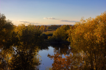 beautiful autumn landscape yellow trees river
