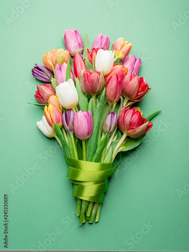 Colorful bouquet of tulips on white background.