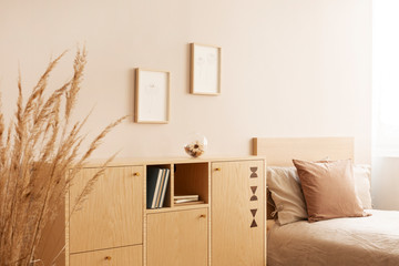Wooden furniture in natural style bedroom for child © Photographee.eu