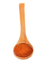 wooden spoon with honey isolated on white background