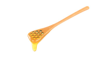wooden spoon with honey isolated on white background