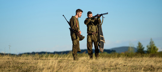 Hunting skills and weapon equipment. How turn hunting into hobby. Friendship of men hunters. Army...
