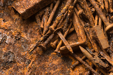 iron box with rusty nails