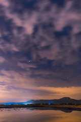 Fototapeta premium Starry sky reflected in the water