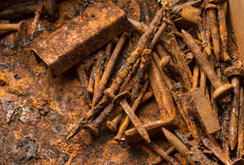 iron box with rusty nails