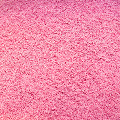 Raw powderof pomegranate, background.