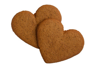 Heart shaped cookies. Gingerbread. Isolated on white background. Traditional Christmas cookies in Norway, Sweden, Denmark, Iceland, Estonia and Latvia.