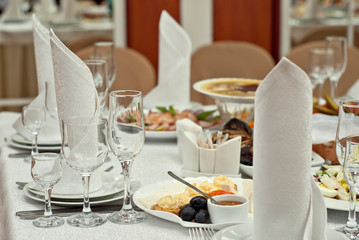 delicious dishes on the table in the restaurant. serving table.