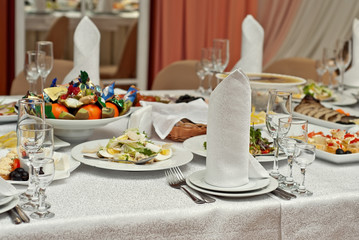 delicious dishes on the table in the restaurant. serving table.