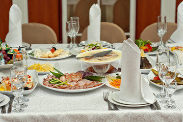 delicious dishes on the table in the restaurant. serving table.