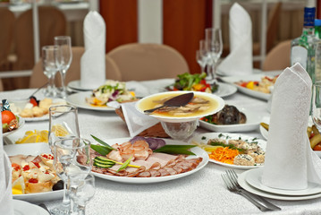 delicious dishes on the table in the restaurant. serving table.