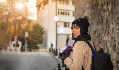 Fototapeta na wymiar Beautiful woman traveler tourist with backpack