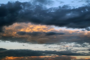 amazing colorful sun colored partially cloudy sky for using in design as background.