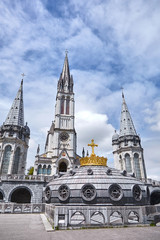 Obraz premium Lourdes, France: The Sanctuary of Our Lady of Lourdes is one of the largest pilgrimage centers in Europe