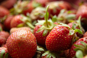strawberry background, harvest of red ripe summer berries