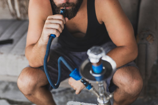 Man using hookah