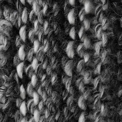 black and white knitted knit fabric. knitted texture