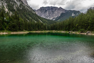green lake in the mountains