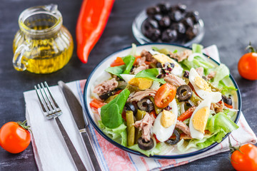 Nicoise salad with tuna, green beans, basil and fresh vegetables