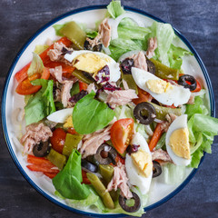 Nicoise salad with tuna, green beans, basil and fresh vegetables