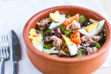 Nicoise salad with tuna, green beans, basil and fresh vegetables