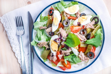 Nicoise salad with tuna, green beans, basil and fresh vegetables