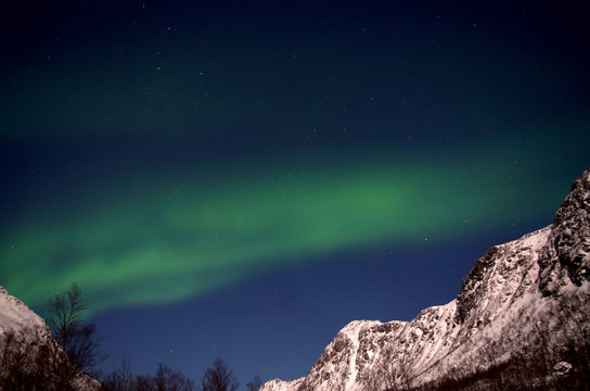 Aurora Borealis, Polarlichter Nachts in Tromsø, Norwegen © Anna