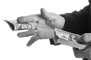Business man holding money on white background
