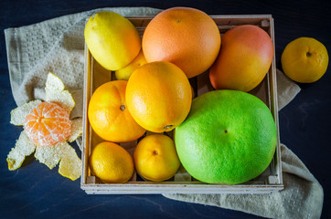different citrus fruits in the box