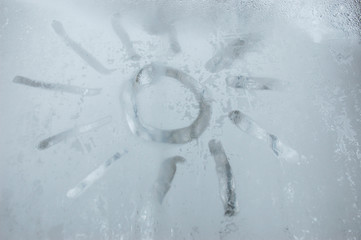 In winter, you want a summer sun. The image on the glass.