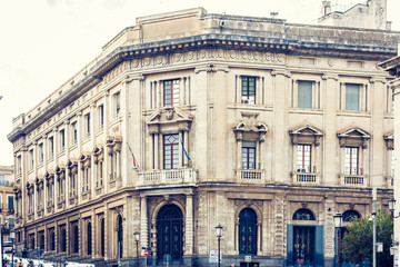 Fototapeta na wymiar Beautiful cityscape of Italy, historical street of Catania, Sicily, facade of old building.