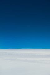 Fototapeta na wymiar Sky background over spread cloud with blue copy space