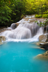 Fototapeta na wymiar Erawan Waterfall in Thailand is locate in Kanchanaburi Provience. This waterfall is in Erawan national park