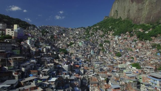 Favela Aerials: Rising wide shot of Rocinha favela, Rio de Janeiro, Brazil