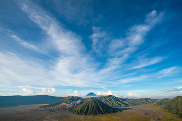 Bromo mountain , day time with dramatic cloud on blue sky..